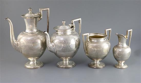 A Victorian four piece silver vase shaped pedestal tea and coffee set, by Martin, Hall & Co, gross 67.5 oz.